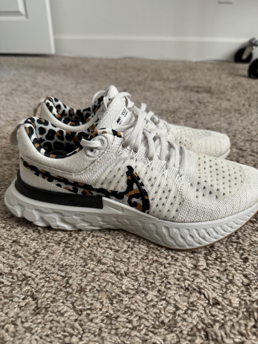 Nike Women's White Sneakers with Leopard-Print Swoosh